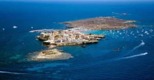 Crystal-clear water and small fishing boats near Tabarca Island
